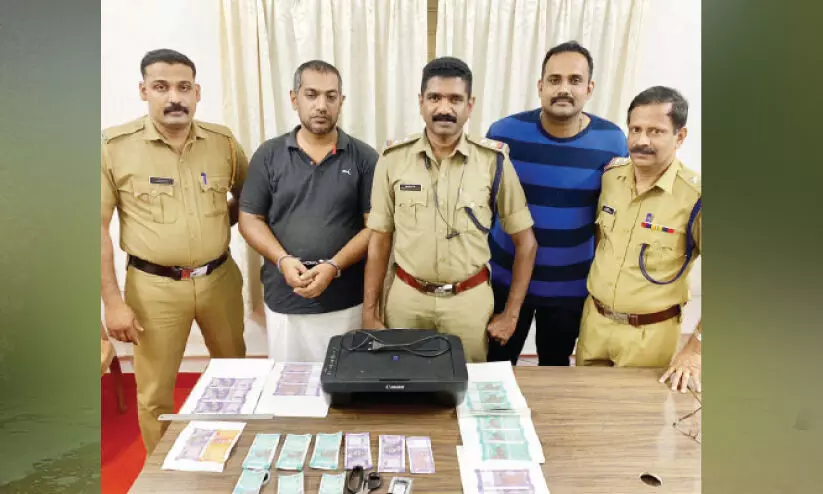 കള്ളനോട്ടുമായി ഓട്ടോ ഡ്രൈവർ പിടിയിൽ കള്ളനോട്ടുമായി ഓട്ടോ ഡ്രൈവർ പിടിയിൽ