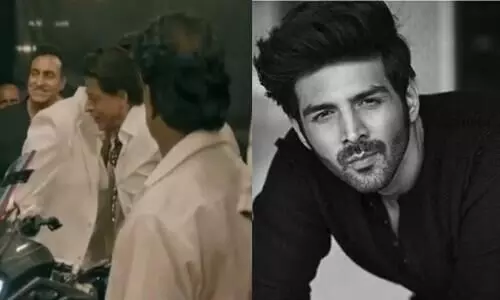 Kartik Aaryan Opens Up About   His And Shah Rukh Khans whispering Viral Video