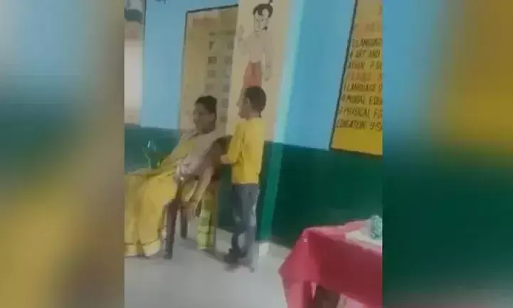 ഉത്തർ പ്രദേശ് സ്കൂളിൽ ആൺകുട്ടിയെ കൊണ്ട് മസാജ് ചെയ്യിപ്പിച്ച അധ്യാപികക്ക് സസ്പെൻഷൻ ഉത്തർ പ്രദേശ് സ്കൂളിൽ ആൺകുട്ടിയെ കൊണ്ട് മസാജ് ചെയ്യിപ്പിച്ച അധ്യാപികക്ക് സസ്പെൻഷൻ