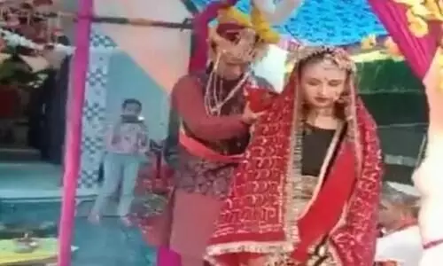 Russian national Sergei Novikov got married to his Ukrainian girlfriend Elona Bramoka