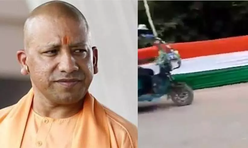 Before Yogis visit, the dirt road was covered with a tricolor flag