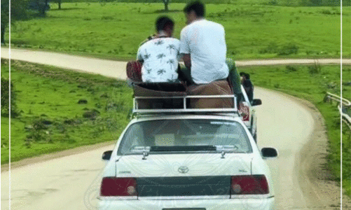 കാ​റി​ന്​ മു​ക​ളി​ൽ യാ​ത്ര​ക്കാ​രെ ഇ​രു​ത്തി​യ ഡ്രൈ​വ​ർ അ​റ​സ്റ്റി​ൽ