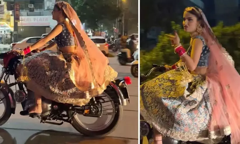 Woman dressed as bride rides Royal Enfield to the wedding