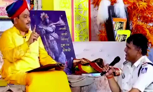 Cop Takes Guidance From Godman