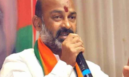 Telangana BJP chief defends carrying Amit Shah’s footwear