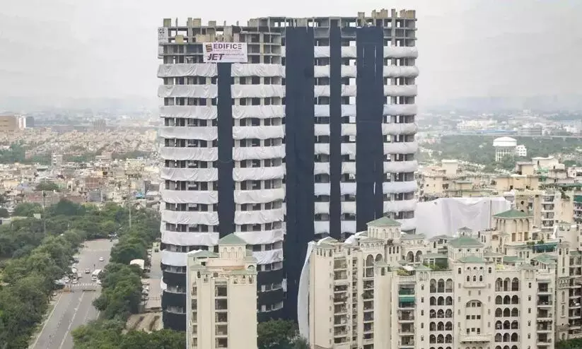 സ്ഫോടനത്തിൽ തകർക്കുന്ന ഇരട്ട ടവറുകൾക്ക് സമീപം ഡ്രോണുകൾക്ക് നിരോധനം സ്ഫോടനത്തിൽ തകർക്കുന്ന ഇരട്ട ടവറുകൾക്ക് സമീപം ഡ്രോണുകൾക്ക് നിരോധനം