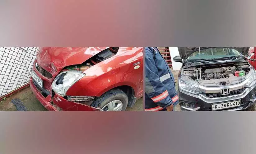 പിന്നോട്ടുവന്ന കാർ മറ്റൊരു കാറിലിടിച്ച് തീപിടിച്ചു പിന്നോട്ടുവന്ന കാർ മറ്റൊരു കാറിലിടിച്ച് തീപിടിച്ചു