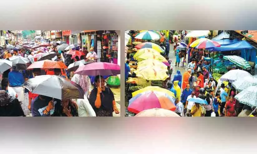 മഴയത്തും ആവേശം ചോരാതെ ഉത്രാടപ്പാച്ചിൽ; മഴയെ അവഗണിച്ച് കുടയും ചൂടി ആളുകൾ മഴയത്തും ആവേശം ചോരാതെ ഉത്രാടപ്പാച്ചിൽ; മഴയെ അവഗണിച്ച് കുടയും ചൂടി ആളുകൾ