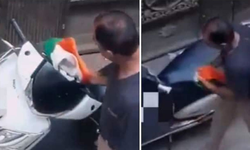 ദേശീയ പതാക ഉപയോഗിച്ച് സ്കൂട്ടർ വൃത്തിയാക്കി