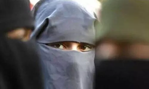 priest wearing pardha