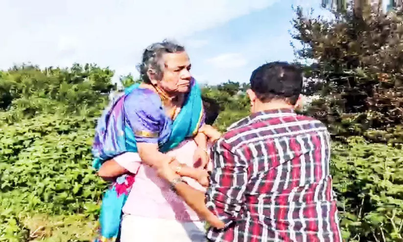 Elikutty went to see Neelakurinji blooming on her sons shoulder
