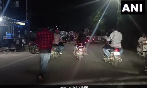 Man Tied To Two-Wheeler
