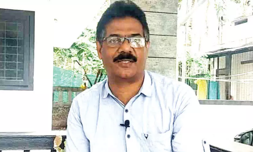 ലോഗോ രൂപകല്‍പനയില്‍ സെഞ്ച്വറി പിന്നിട്ട് അധ്യാപകൻ