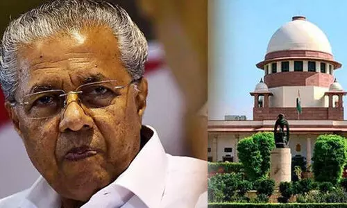 pinarayi vijayan 98675