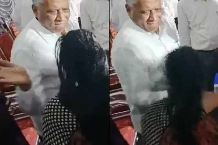കർണാടക മന്ത്രി മുഖത്തടിച്ചു; എന്നിട്ടും കാൽതൊട്ട് അപേക്ഷിച്ച് യുവതി