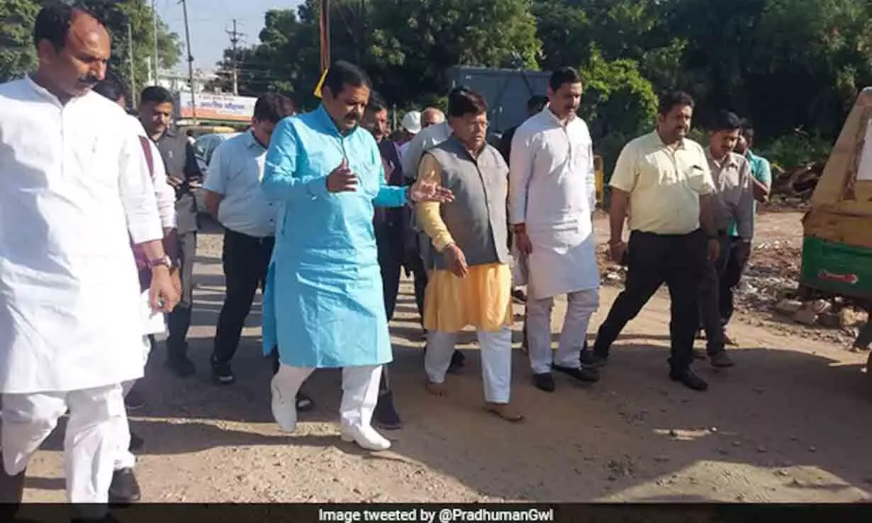 MP minister walks barefoot on pothole-ridden roads