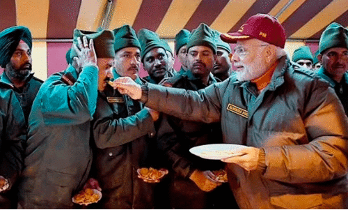 PM Modi exchanges sweets with security personnel