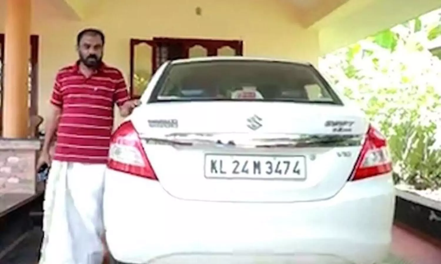 The traffic police fined the car driver for not wearing a helmet