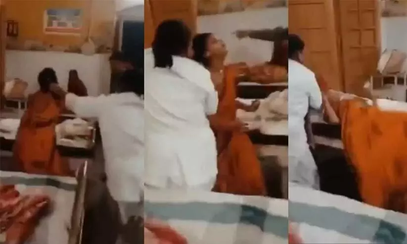 Video: UP Nurse Grabs Woman Patient By Her Hair, Pins Her Down Video: UP Nurse Grabs Woman Patient By Her Hair, Pins Her Down