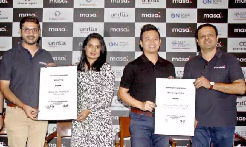 Mithali and Bhutia with scholarship