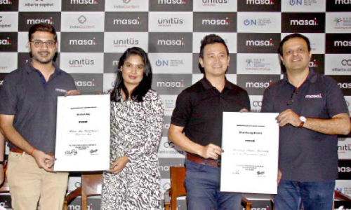 Mithali and Bhutia with scholarship