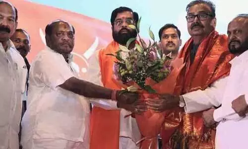 G Kirtikar with Eknath Shinde
