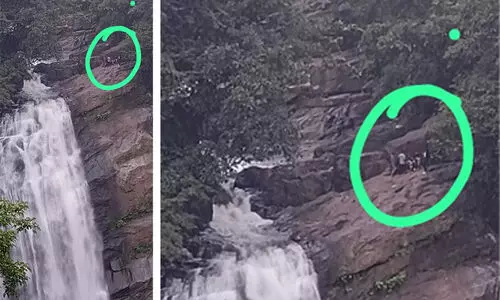 വെള്ളച്ചാട്ടത്തിന് മുകളിലെത്തിയ സഞ്ചാരികൾ പരിഭ്രാന്തി പരത്തി