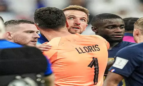 Hugo Lloris and Harry Kane