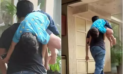 മകനെ തട്ടി തോളിൽ കയറ്റി നടന്നു​പോകുന്ന താരം; ബോളിവുഡിലെ കൂൾ ഡാഡിയുടെ വിഡിയോ വൈറൽ