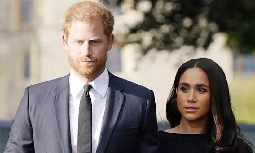 Prince Harry and his wife Meghan Prince Harry and his wife Meghan