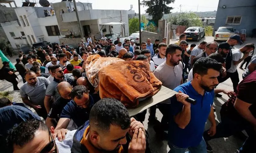 Palestinian shot dead