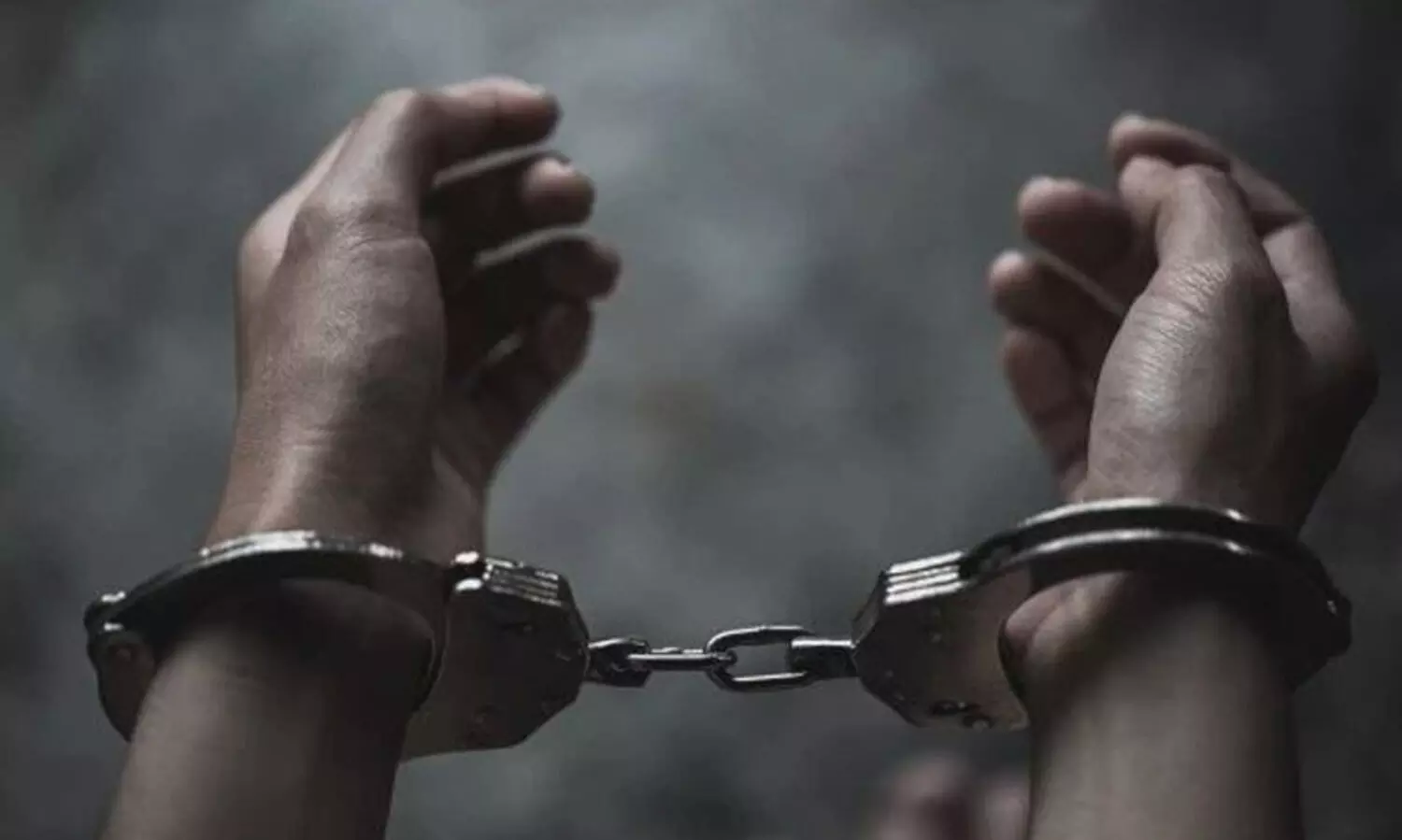 Man held for trying to set ablaze wife and daughter