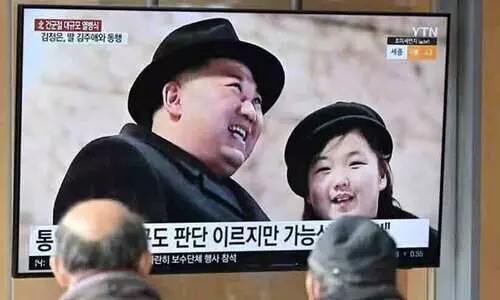 Kim Jong Un with his Daughter