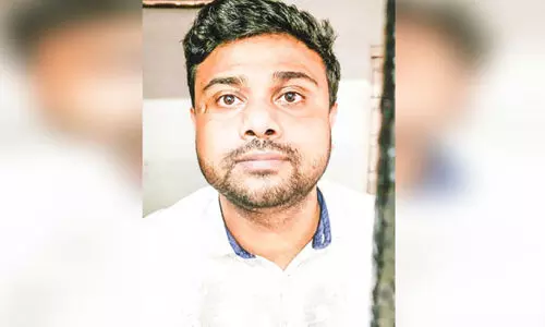 Man arrested for extorting money by offering a foreign job