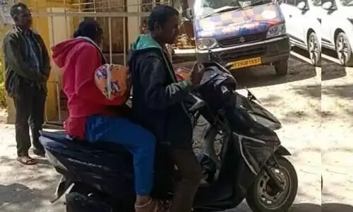 Tribal couple in Andhra carry their baby’s dead body on two-wheeler for 100 km Tribal couple in Andhra carry their baby’s dead body on two-wheeler for 100 km