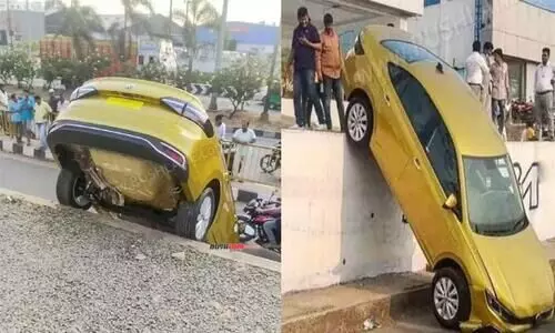 ഡെലിവറി എടുക്കുന്നതിനിടെ പുത്തൻ കാർ നിയന്ത്രണംവിട്ട് താഴേക്ക് പതിച്ചു -വിഡിയോ