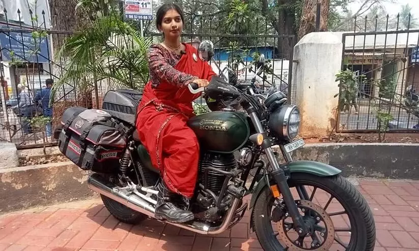 Pune woman to travel the world on a bike wearing Maharashtrian nauvari saree