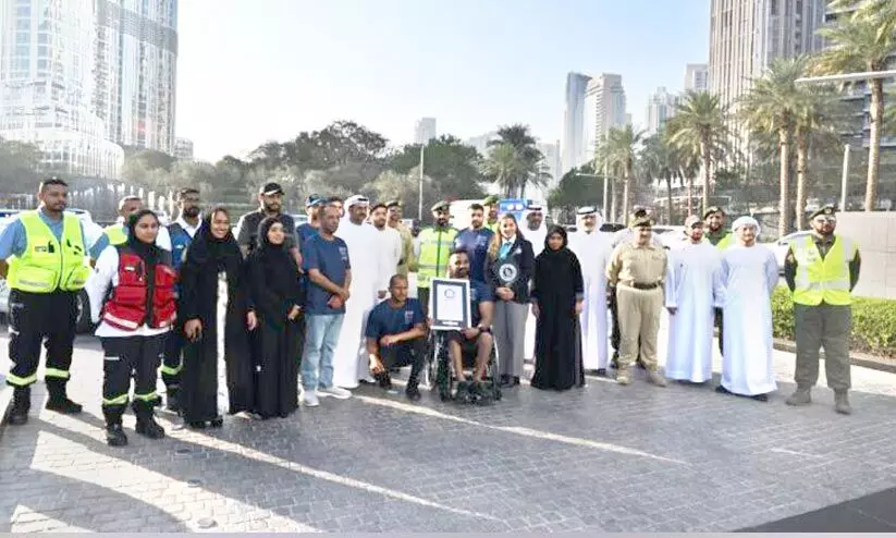 ദു​ബൈ ​പൊ​ലീ​സ്​ അ​ക​മ്പ​ടി​യാ​യി; വീ​ൽ​ചെ​യ​റി​ൽ ലോ​ക റെ​ക്കോ​ഡി​ട്ട്​​ സു​ജി​ത്​