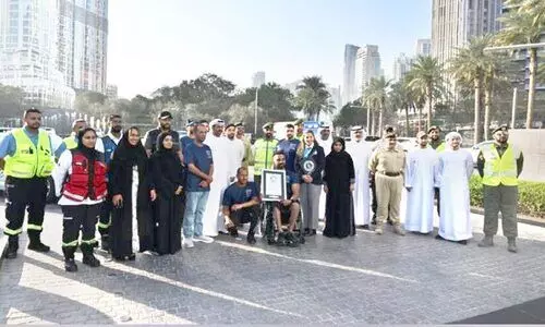 ദു​ബൈ ​പൊ​ലീ​സ്​ അ​ക​മ്പ​ടി​യാ​യി; വീ​ൽ​ചെ​യ​റി​ൽ ലോ​ക റെ​ക്കോ​ഡി​ട്ട്​​ സു​ജി​ത്​