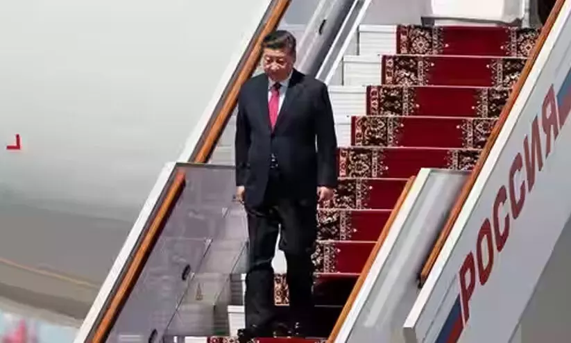 Xi Jinping lands in Russia