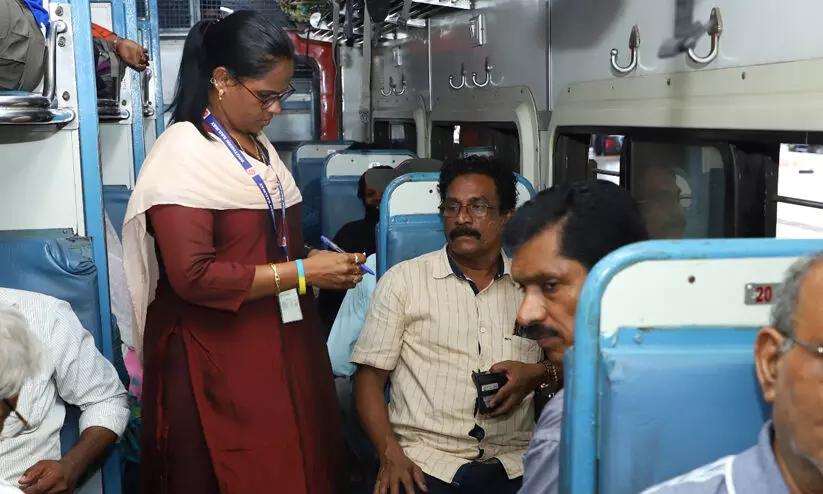 female ticket-checker female ticket-checker