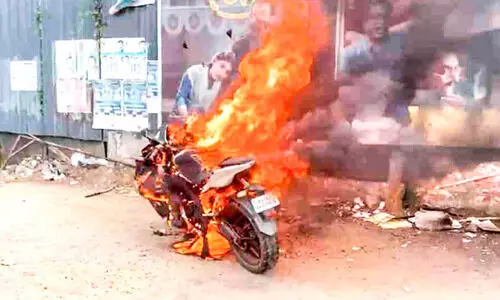 Running bike catches fire