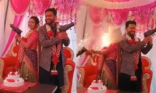 Bride burns her face while posing with firecracker gun