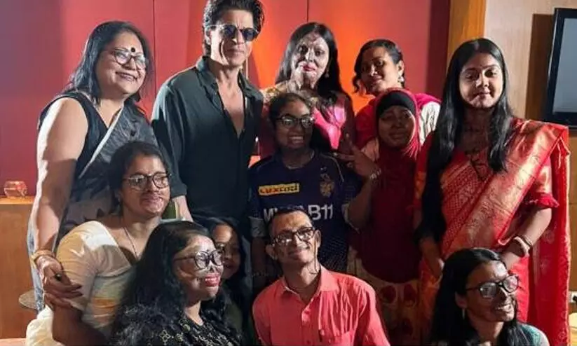 Actor Shah Rukh Khan with acid attack survivors in Kolkata.