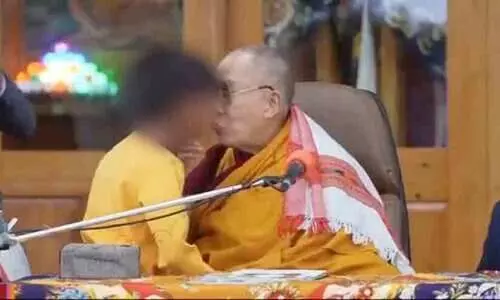Dalai Lamas video asking minor boy to suck his tongue triggers row