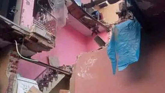 Rice mill building collapses