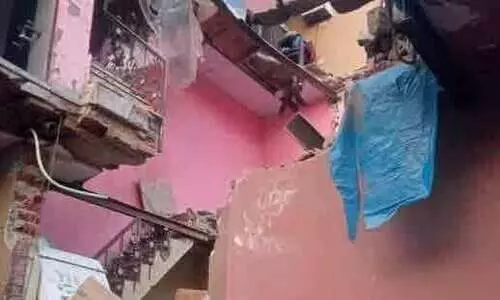 Rice mill building collapses
