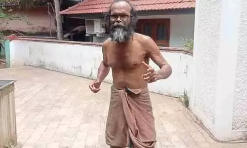 പി.ടി. ഉഷക്കെതിരെ പിറകോട്ടോടി സുരേന്ദ്രന്റെ പ്രതിഷേധം