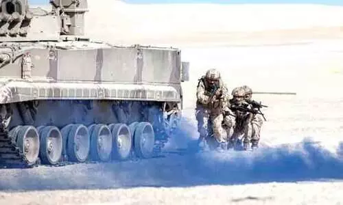 സാ​യു​ധ​സേ​ന ഏ​കീ​ക​ര​ണ  സ്മ​ര​ണ​യി​ൽ ഇ​മാ​റാ​ത്ത്​