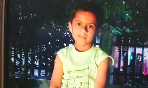 Man Strangles Son, 7, In Sleep